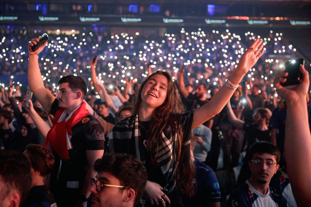 Spectators and fans of esport club Karmine Corp attend a 6.5-hour show of the fourth edition of KCX4: Forever Rivals at Paris La Defense Arena in Nanterre, on the outskirts of Paris, on November 9, 2024. After breaking the European attendance record for an esport event with 29,000 spectators at last year's KCX 3, esport club Karmine Corp returns for KCX 4: Forever Rivals. The event is broadcast live on the Twitch channel of Kamet0, co-founder of Karmine Corp, on November 9, 2024. (Photo by Kiran RIDLEY / AFP) (Photo by KIRAN RIDLEYKIRAN RIDLEY/AFP via Getty Images)